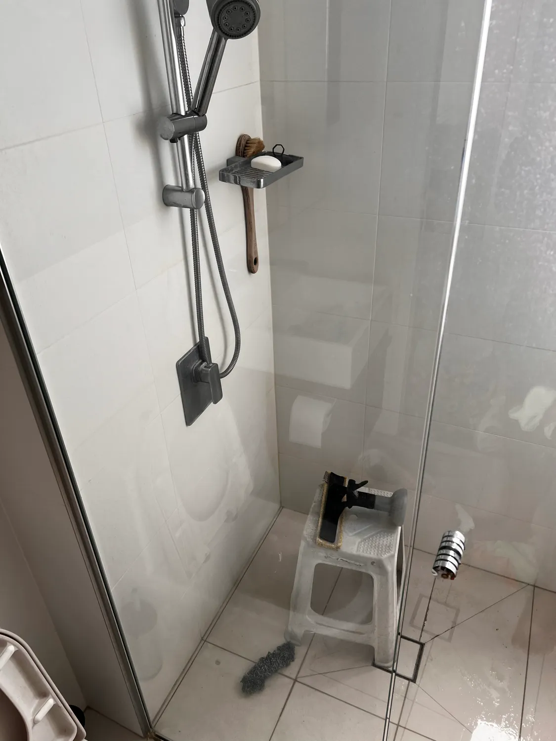 Shower glass with calcium buildup after cleaning