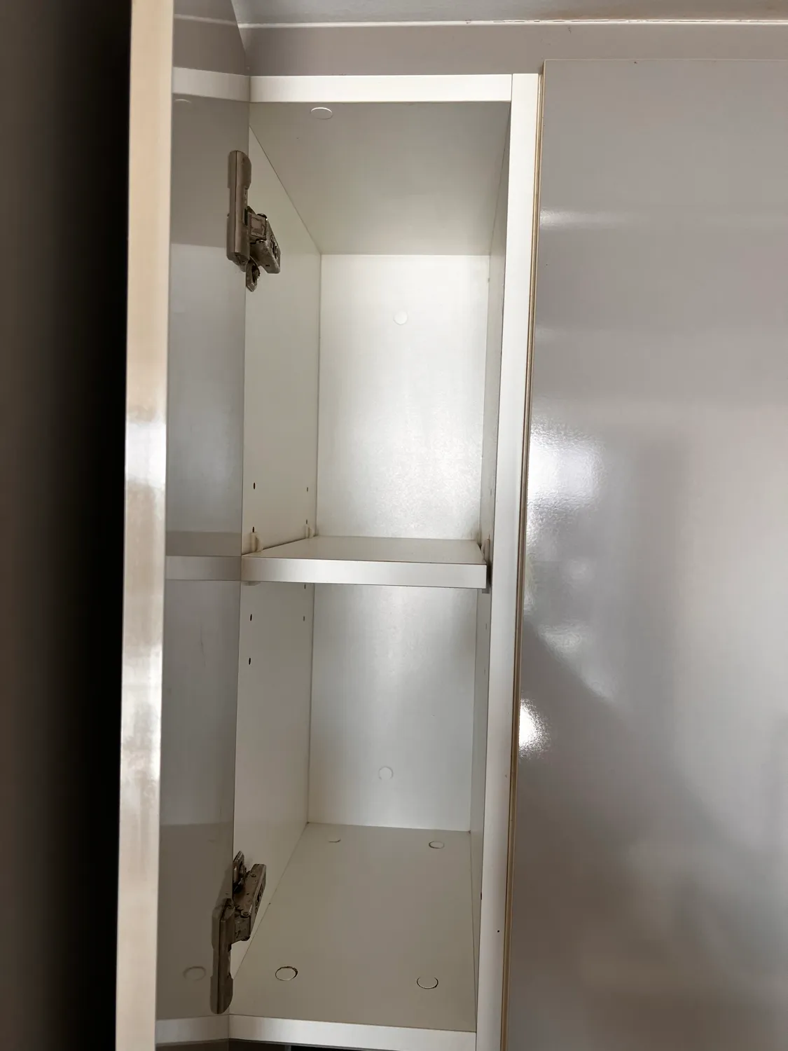 Cupboard interior shelf after cleaning