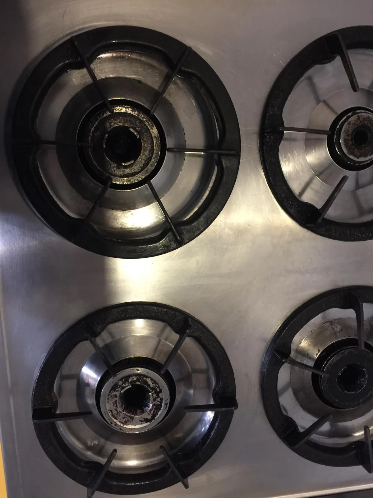 Cooktop burners rusty after cleaning