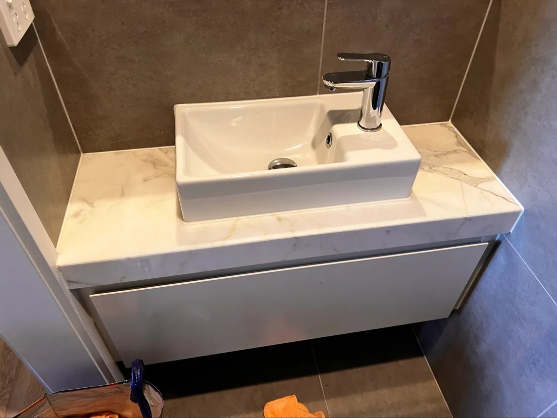 Bathtub with mosaic tiles after cleaning