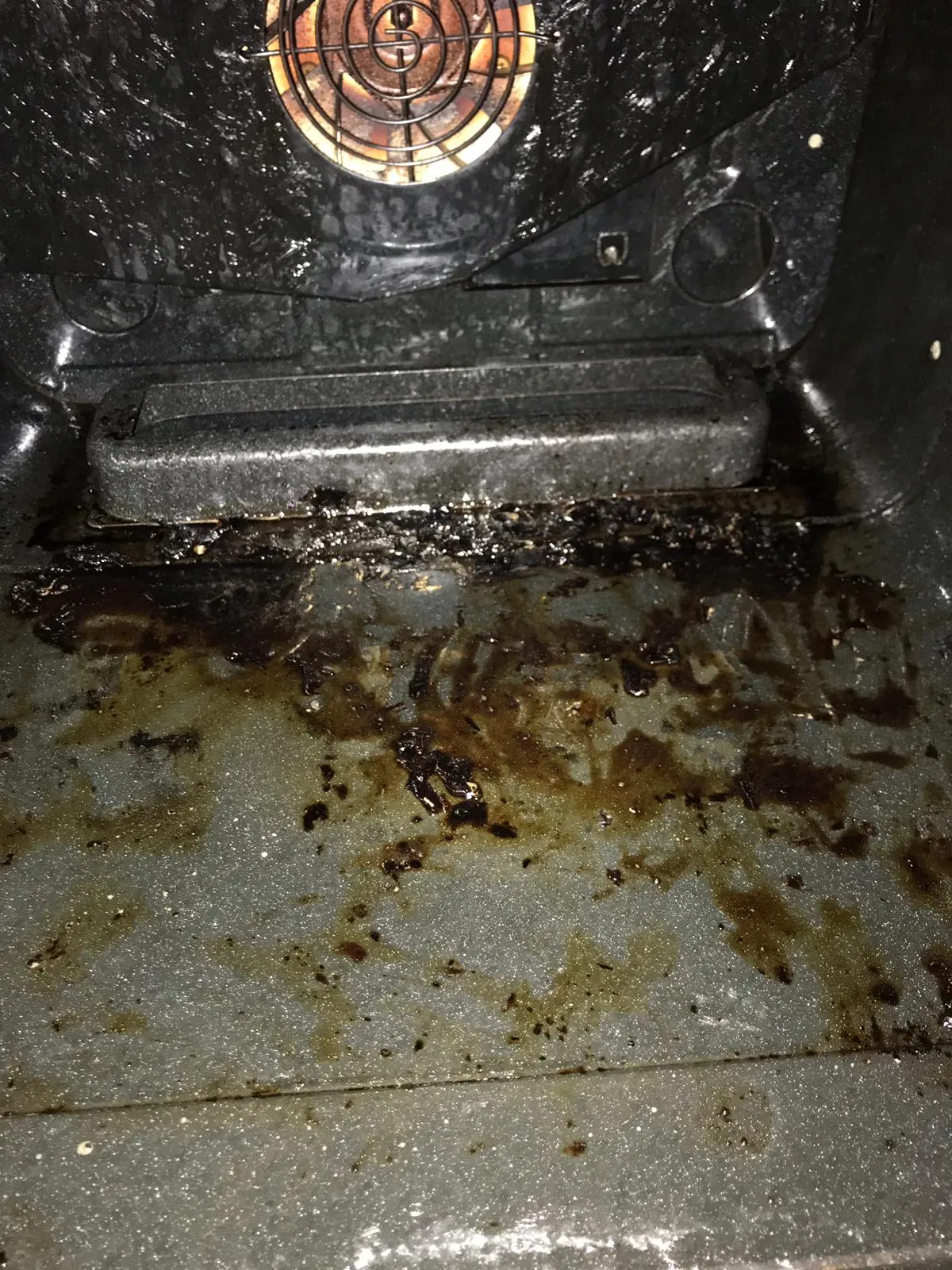 Oven floor before cleaning